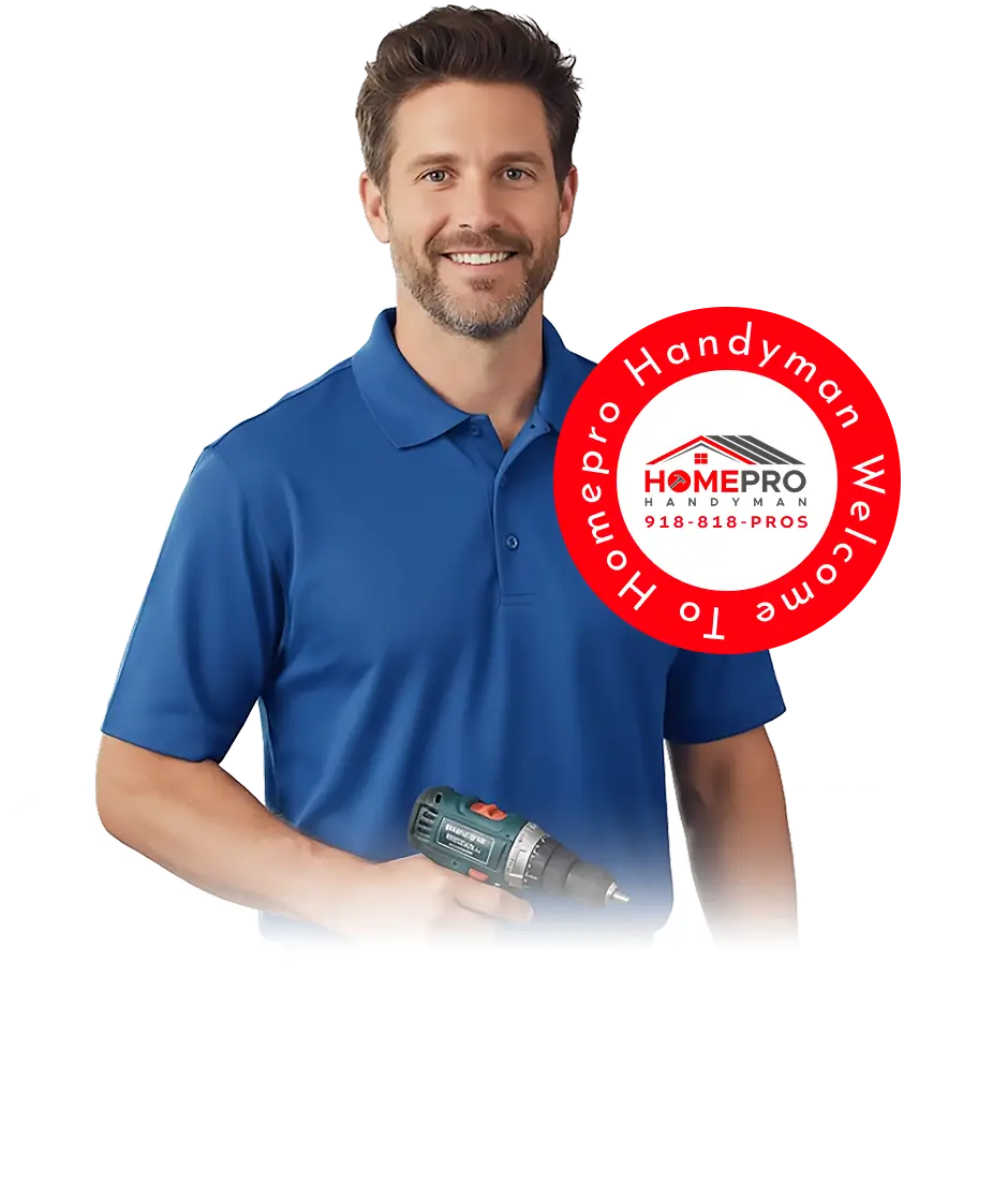 A a local handyman is holding a drill while wearing a blue shirt